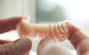 Many people don’t realize their denture is due for a replacement or adjustment until discomfort becomes hard to ignore.
